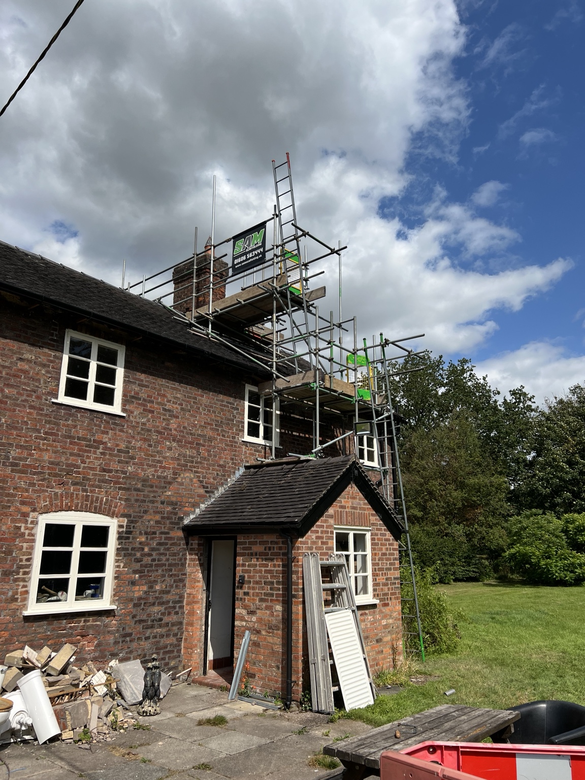 Side view of the chimney access scaffold above an estate building at Arley Hall