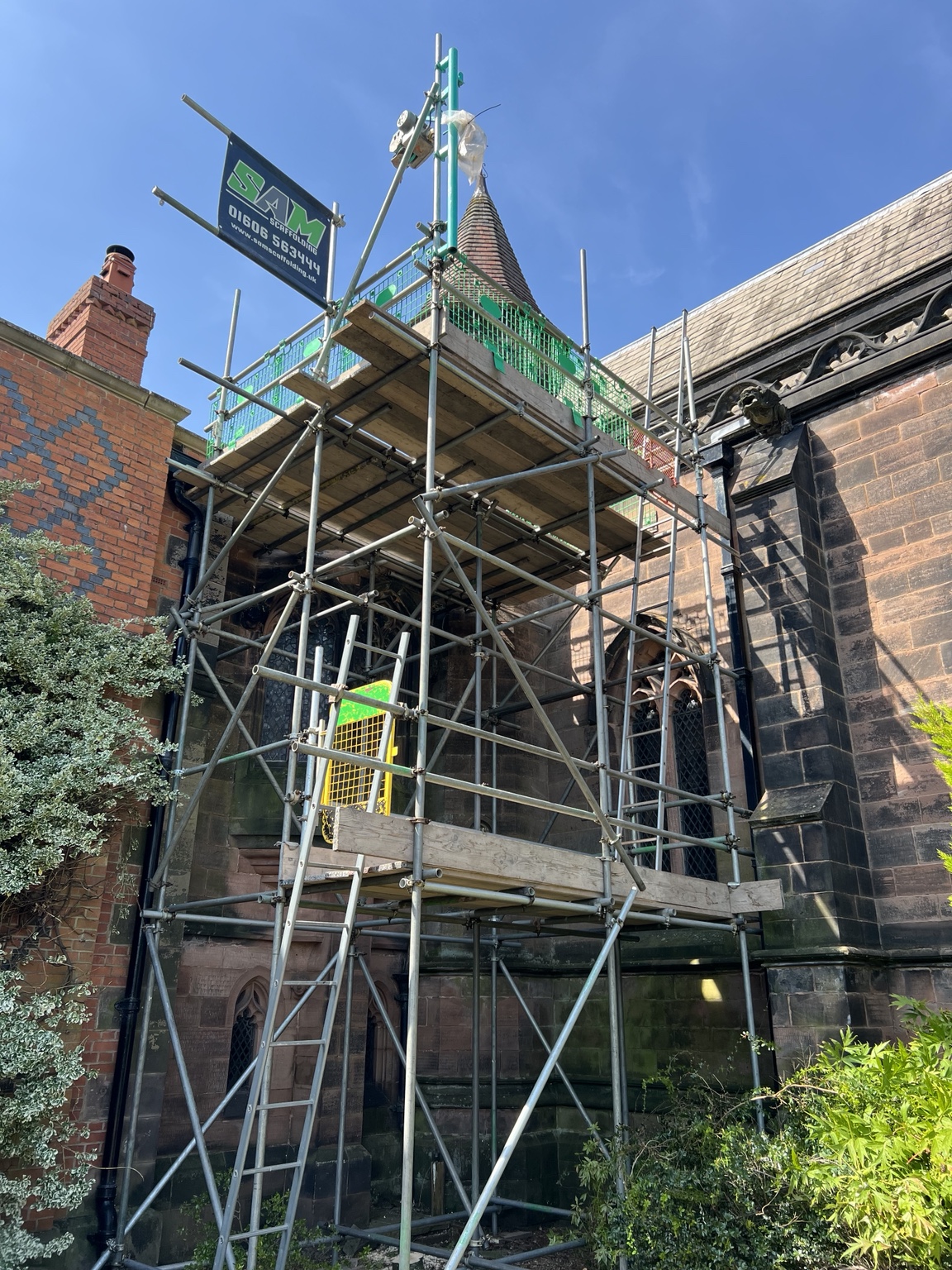 SAM Scaffolding tower providing access to the roof and stonework at Arley Hall