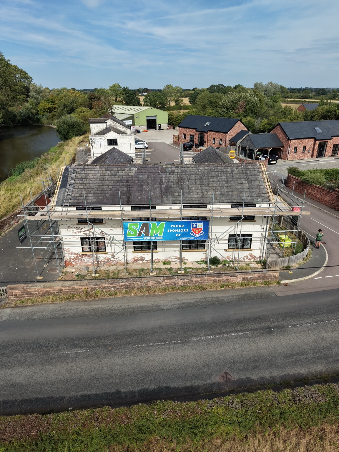 Elevated front view of Kingsley Mill with SAM Scaffolding access along the roofline
